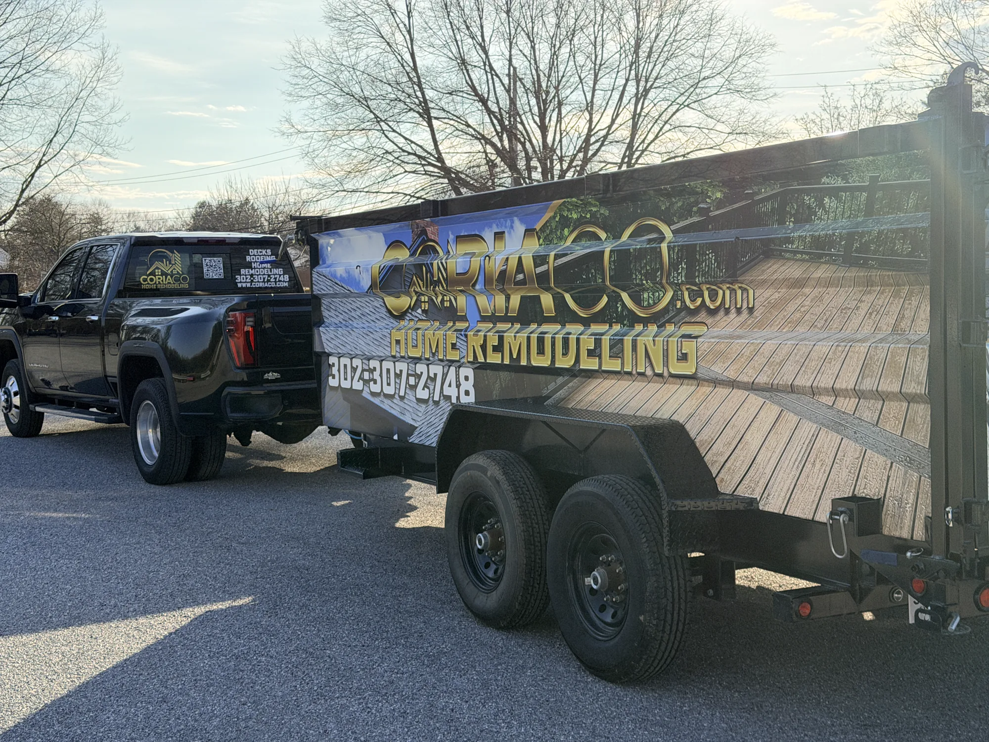 Matching rear-window decals and full dump trailer wrap for CoriaCo Home Remodeling — deck and roofing graphics designed, printed, and installed by ZeroDegree Signs in Delaware
